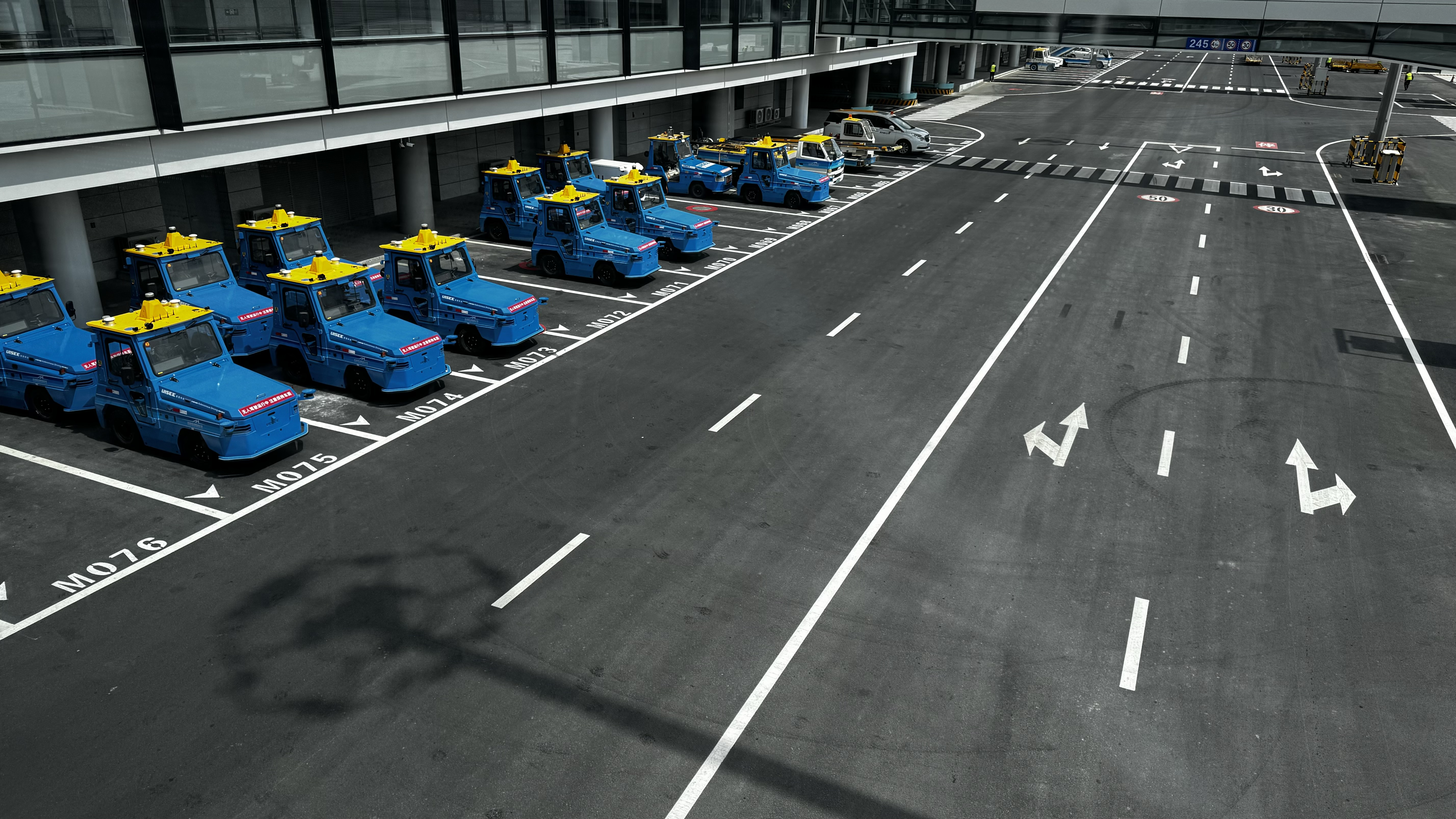 UISEE autonomous vehicle fleet at industrial site